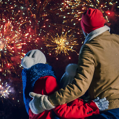 couple watching fireworks for New Year's celebration 